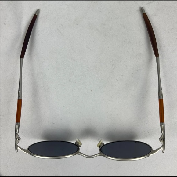 OAKLEY OO Michael Jordan E-Wire Blue Iridium/Matte Silver Gen 1 Round Sunglasses - Picture 3 of 10